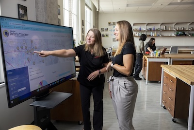 Student working with a professor