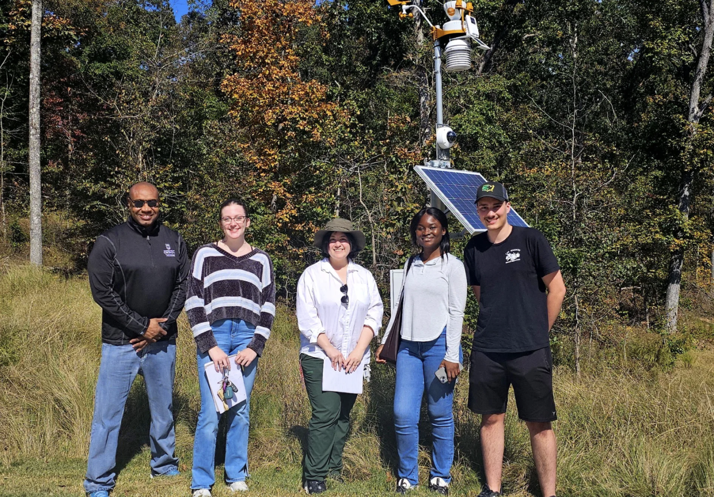 Members of UGA’s WeatherRisk Vertically Integrated Projects for Research team outside in the forest