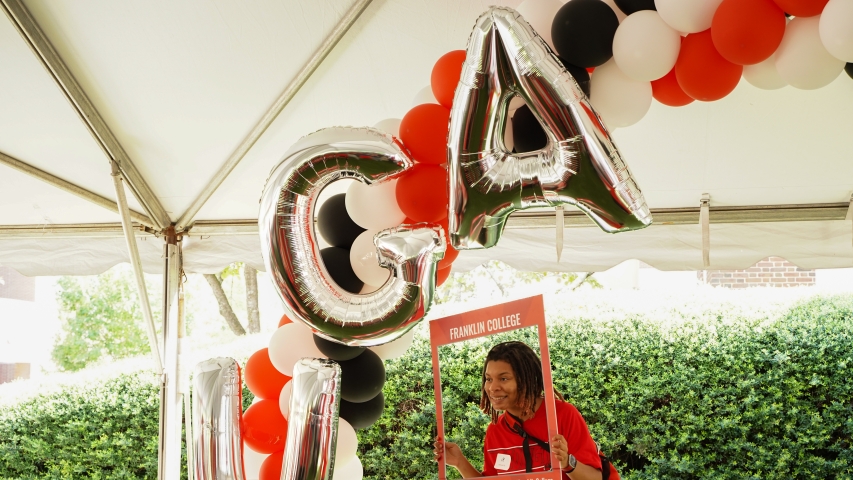 photo of woman with prop