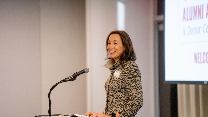 photo of woman at podium