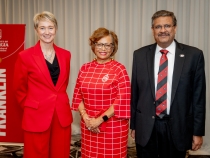 Photo of three people