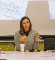 photo of woman seated at table, ppt