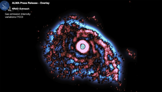 digital image of planetary disk, with blue, red, and space in black