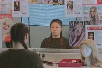 promo photo with girl sitting before mirror