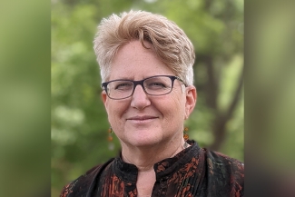 photo of woman, with glasses, outdoors