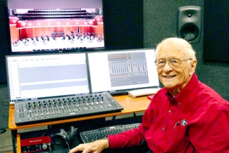 photo of man at recording board