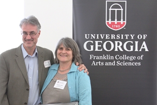 photo of man and woman with plaque