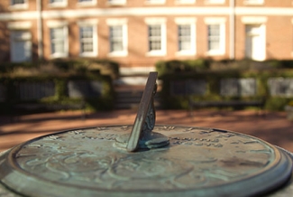 sundial photo behind Old College