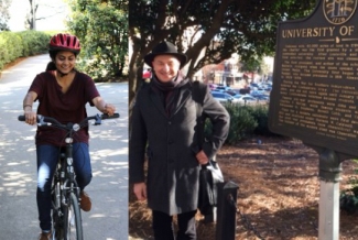 girl on bike, man with sign