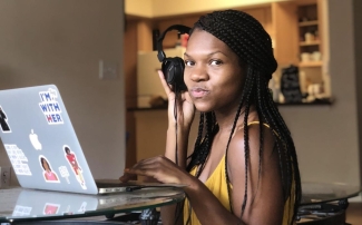 photo of woman with laptop computer