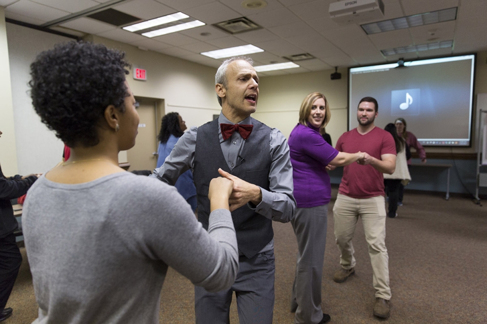 Fuad Elhage (with bowtie) leading a dance workshop