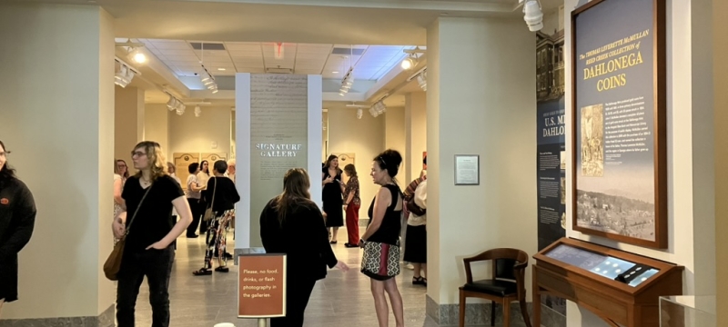 photo of people and exhibits in gallery