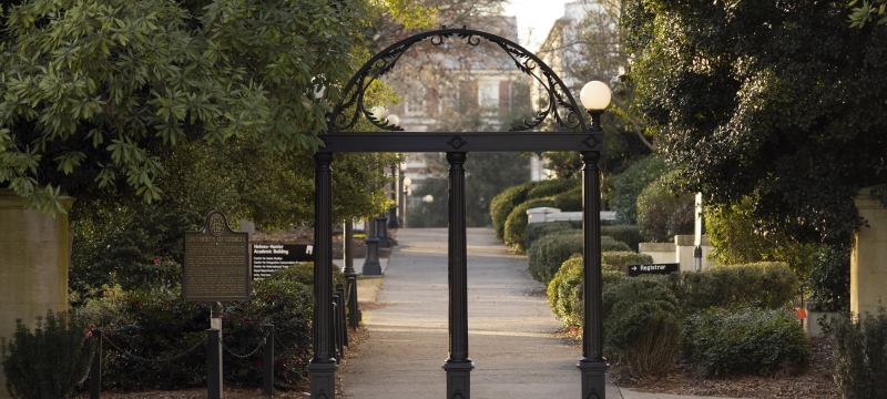 photo of arch and buildings, day