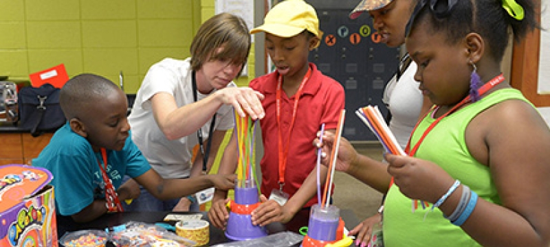 kids making art in a classroom