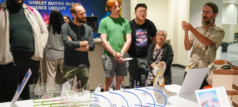 photo with 7 people, art objects