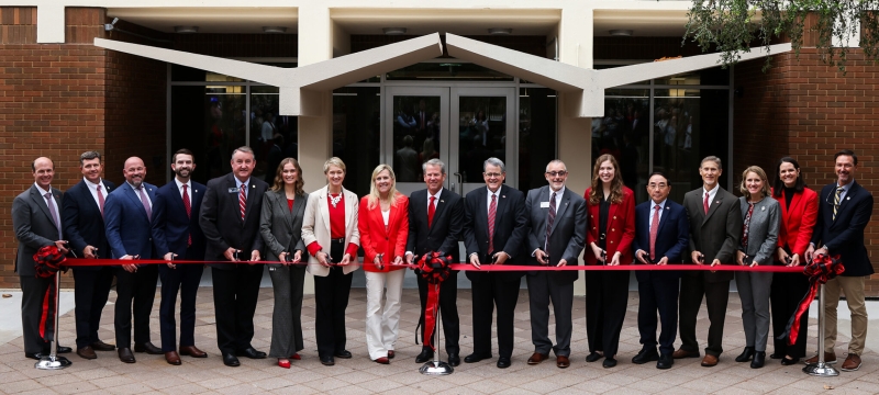 group photo of ribbon cutting, day
