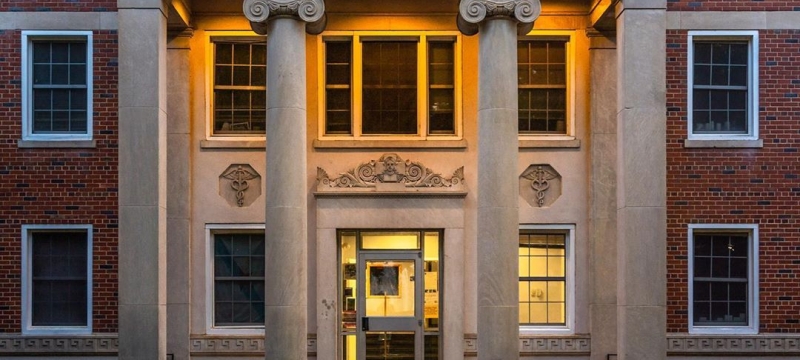 photo of building facade, with columns