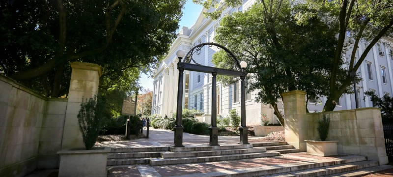 photo of arch and buildings, day