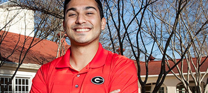man in red at visitor's center