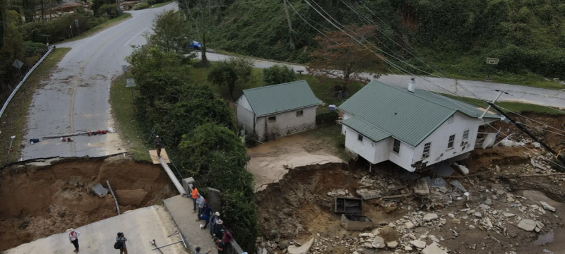 aerial photo of storm damage, road collapse