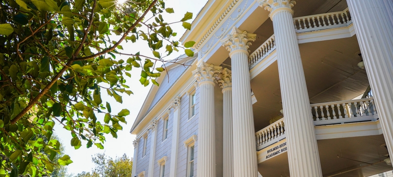 photo of building with greek columns, day