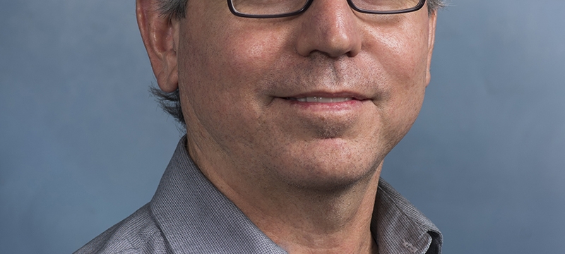 studio headshot photo of man