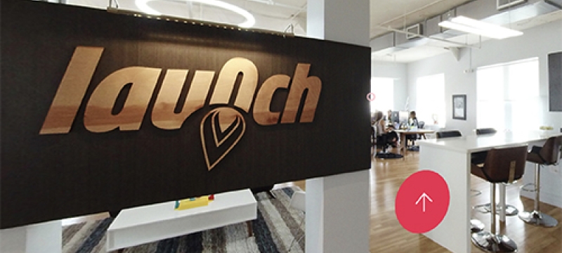 inside of an office space, with sign 'Launch'