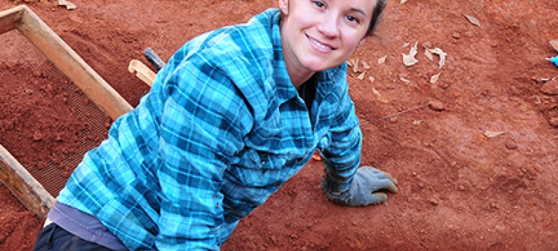 woman on archeological dig