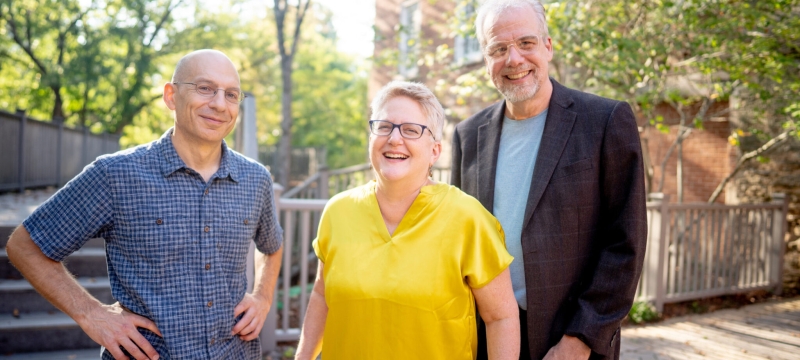 photo of three people outdoors