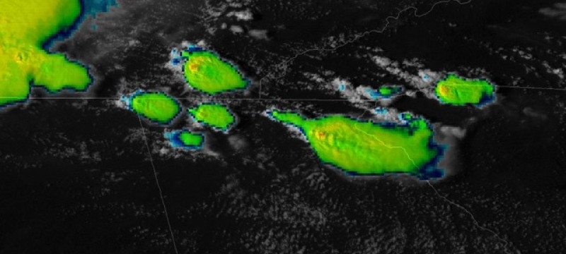 satellite image of island on black ocean