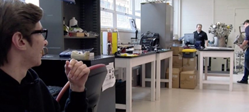 photo of students in a physics lab