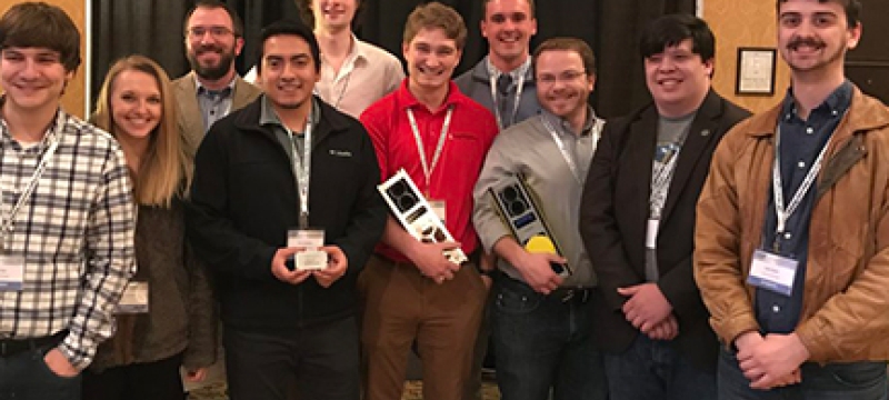 group photo with small satellite parts