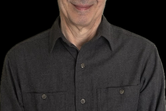 Baruch Halpern in front of black background