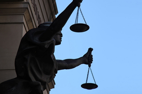 photo of statue representing blind justice