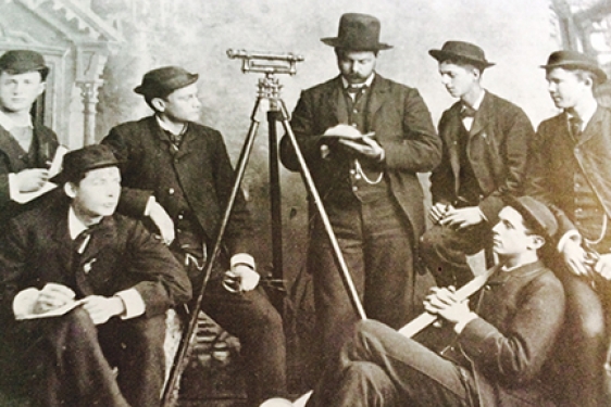 historical black and white photo of men with instruments