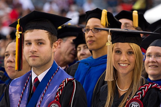 people in caps and gowns