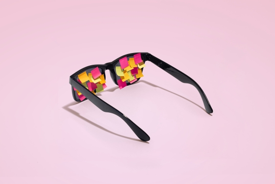 photo of sunglasses with small post-it notes on lenses