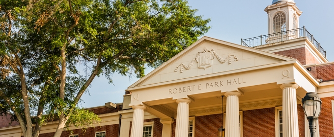 photo of building with columns and cupola